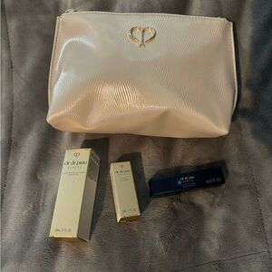 Cle de Peau Skincare Set with Cream and Gold Accents